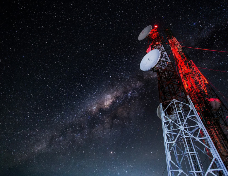 Telecommunications tower against the night sky